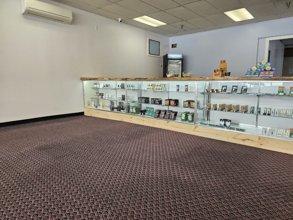 Cannabis product display case inside Daily Buds Dispensary